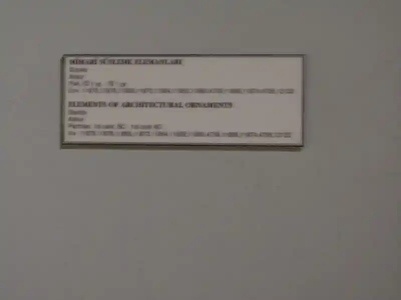 Six-pointed cross inside a circle on an architectural ornament